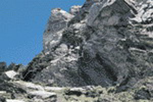 * 圖說：圖2. 中央山脈板岩區常夾雜中等厚度灰白色結晶石灰岩(南湖陶塞峰)* 作者：莊文星